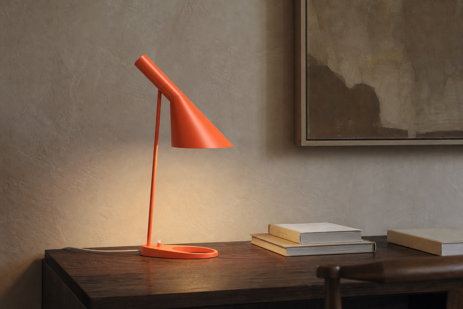 Electric Orange, Perfect Angle: Living With the Louis Poulsen AJ Table